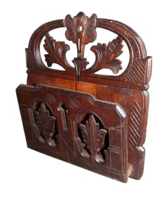 Swiss Black Forest relief carved walnut wall pocket with cross