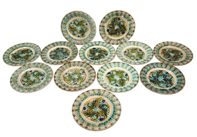 Set of 12 French barbotine plates
