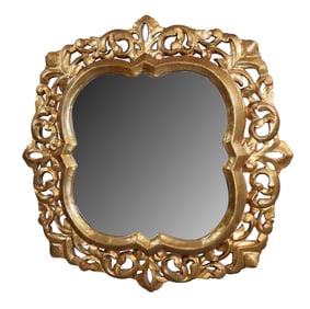 Italian giltwood shield form pierce carved mirror