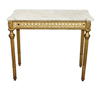 French Louis XVI gold leaf console table on tapered legs with a marble top
