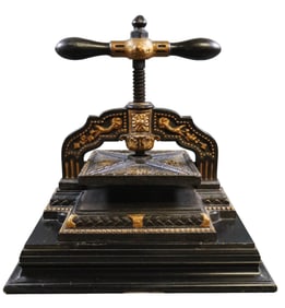 French cast iron book press with gilt accents