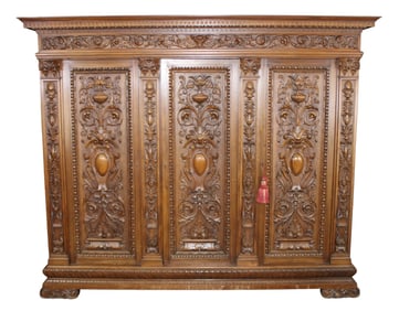 Italian Renaissance 3 door bookcase with relief carved doors