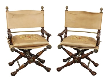 Pair of Maitland Smith campaign style chairs with eagle heads and leather