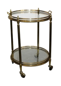 French brass and glass two tier round rolling bar cart
