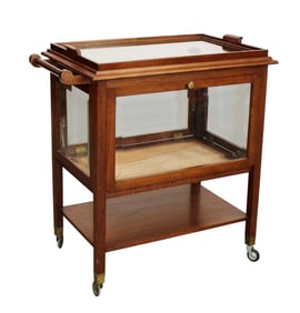 French art deco bar cart with beveled glass doors