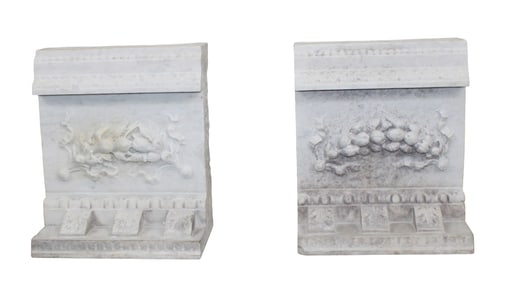Pair of Italian carved white marble architectural fragments