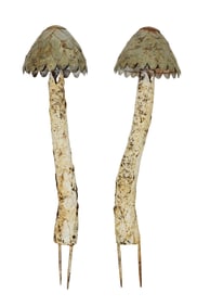 Pair of painted iron garden mushrooms