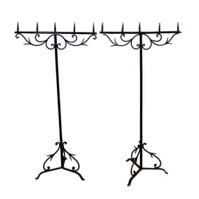 Pair of French iron candle torchieres