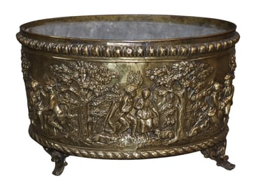 French oval jardiniere in brass with repousse courting scenes