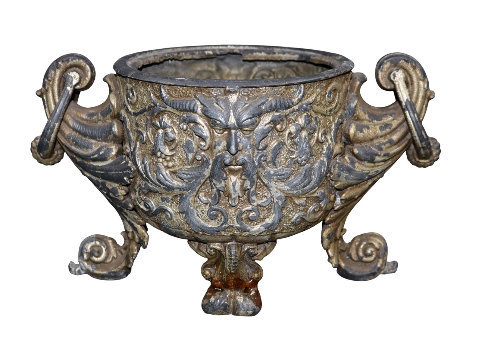 Italian Baroque style cache pot with relief mask: Italian Baroque style cache pot with focal mask in spelter. Early 20th century. 6 5/8"h x 12 1/2"w x 6 3/4"d Weight: 6lb