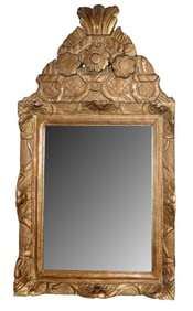 French Louis XVI style giltwood mirror with floral crest