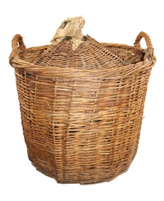 French glass demi-john bottle in wicker basket