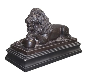 Medici style lion sculpture on plinth