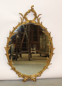Hollywood Regency giltwood mirror with acanthus scrolls