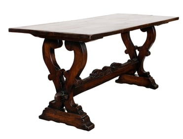 Tuscan library table with carved stretcher