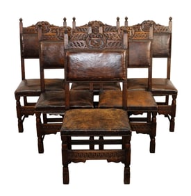 Lot of 6 English oak side chairs in leather with carved crest