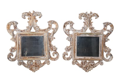 Pair of Italian carved and polychrome wood framed mirrors