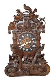 Swiss Black Forest carved walnut cuckoo clock
