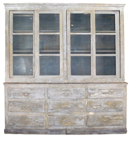 French sliding door apothecary cabinet over bank of 9 drawers