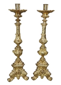 Pair of French polished brass candlesticks