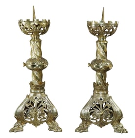 Pair of French Gothic Revival polished bronze altar candle holders