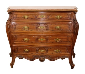 French Louis XV style bombe commode in carved walnut