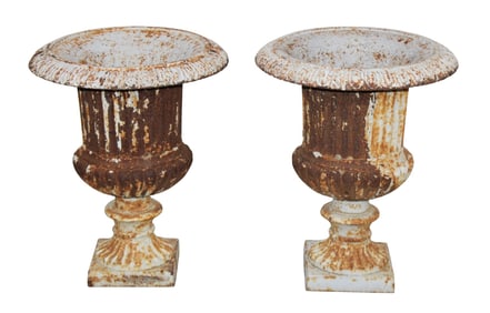 Pair of French cast iron fluted garden urns