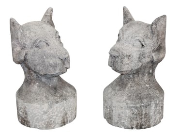 Pair of French cut limestone dog head garden statues