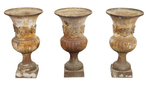 Lot of 3 Italian cast iron garden urns with floral garland in relief