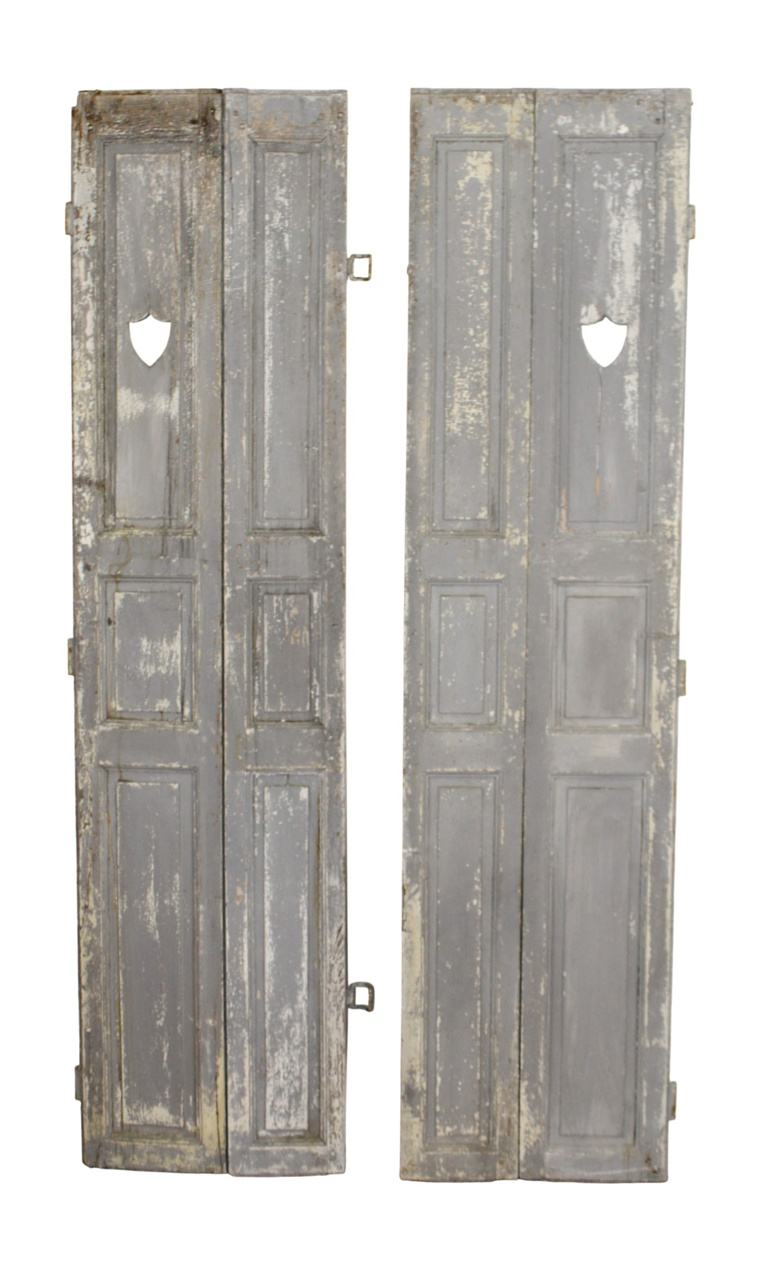 Lot of 2 French bi-fold shutters with shield cut out: Lot of 2 French bi-fold shutters with shield cut out. Early 20th century. 75 "h x 18 1/4"w each shutter