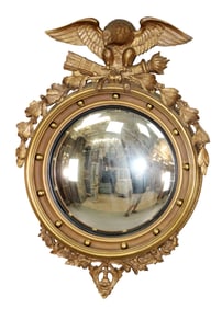American Federal mirror in gilt finish with eagle and convex glass