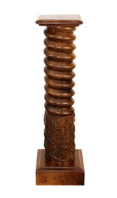 French wine screw mounted as pedestal with ivy