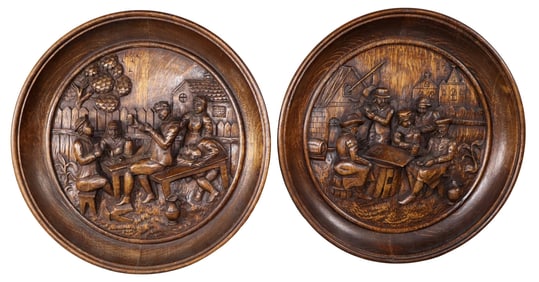 Pair of Bavarian relief carved oak tavern scene wall plaques