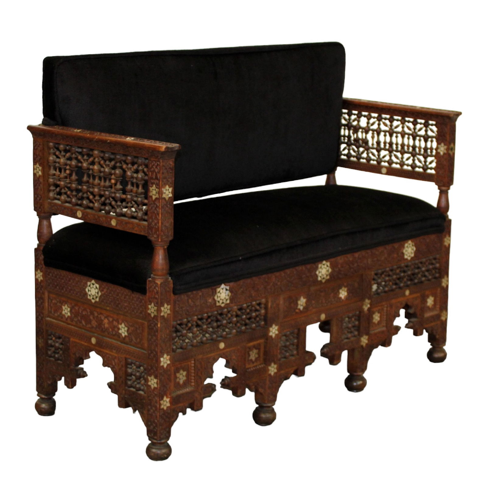 Moorish heavily carved settee with inlays and upholstered seat & back: Moorish heavily carved settee with white shell inlays and upholstered seat & back. 34 1/2"h x 43"w x 18 1/2"d. Seat height: 19 1/2"h