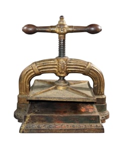 French cast iron table top book press