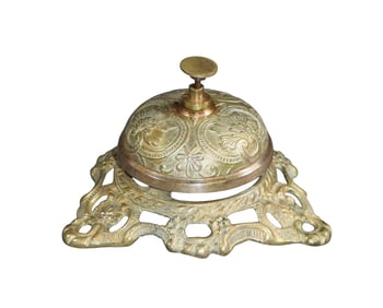 Ornate brass hotel bell