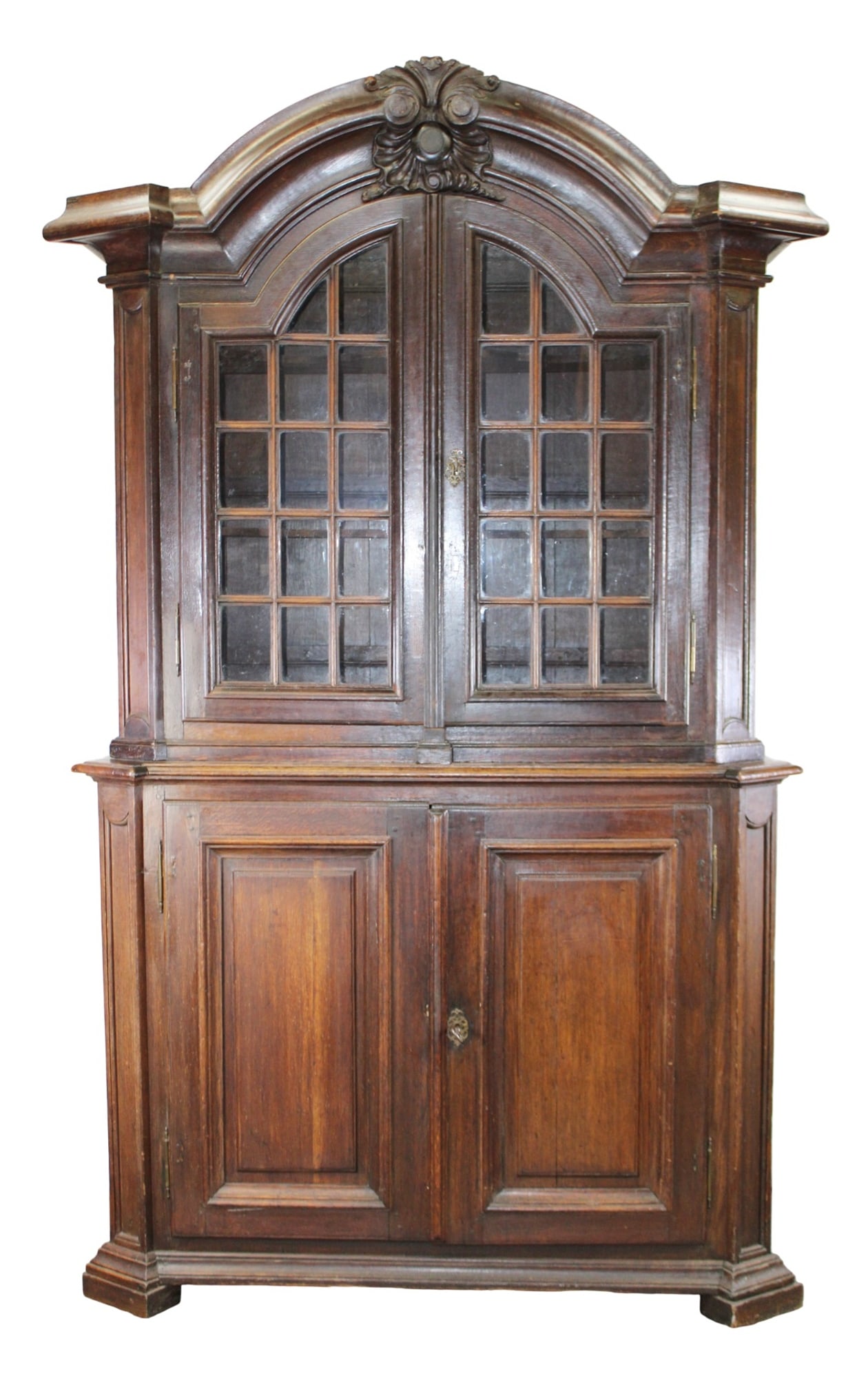 French arch top buffet deux corps in dark waxed walnut: French arch top buffet deux corps in dark waxed walnut with paned glass upper doors. Late 19th century. 95 1/2"h x 55 1/2"w x 21 1/2"d