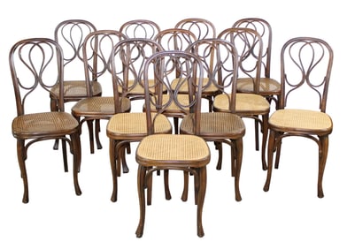 Set of 12 French bentwood cafe chairs with caned seats