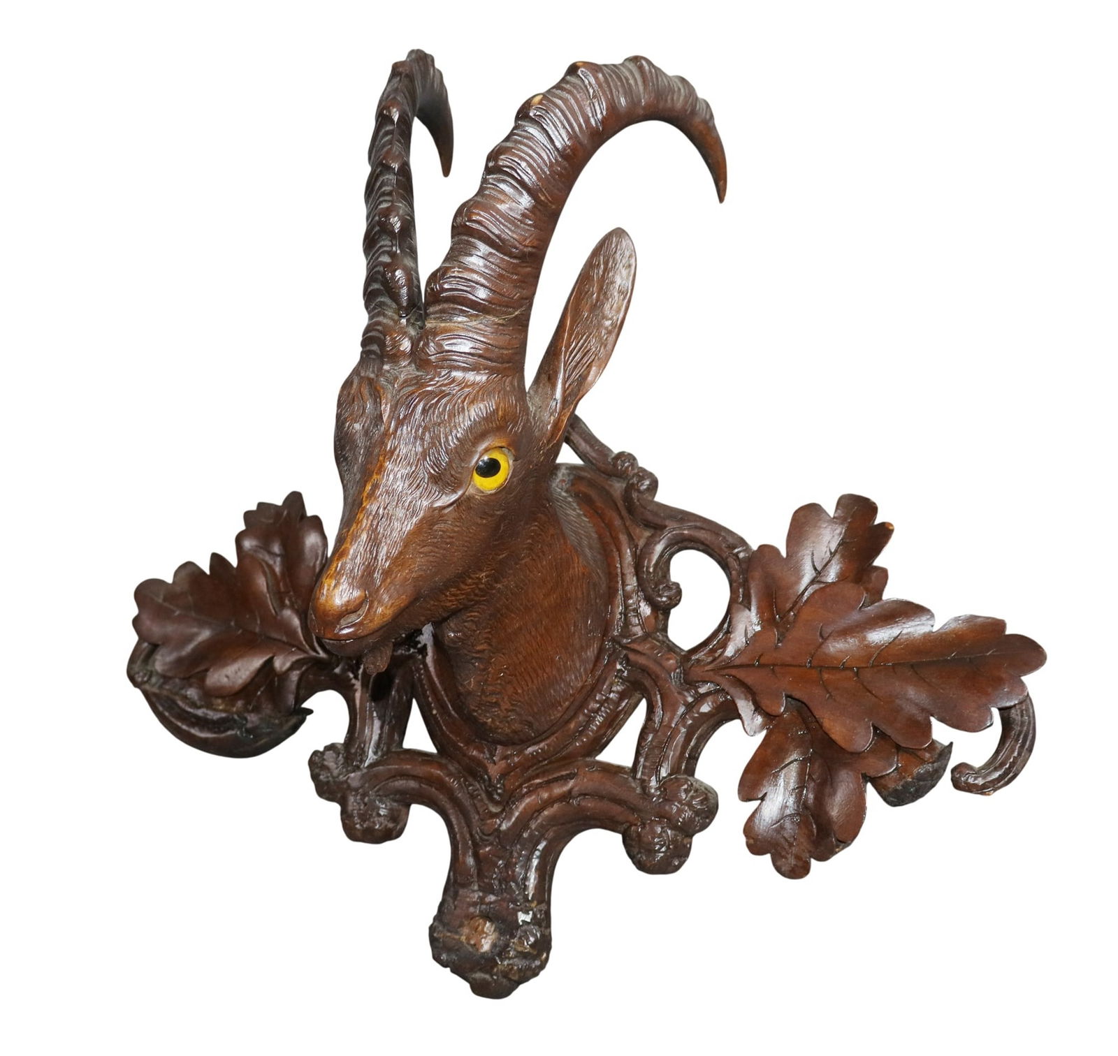 Black Forest relief carved antelope trophy plaque: Black Forest relief carved antelope trophy plaque with glass eyes. Late 19th century. 13 1/2"h x 15"w x 5 1/2"d. Weight:1lb
