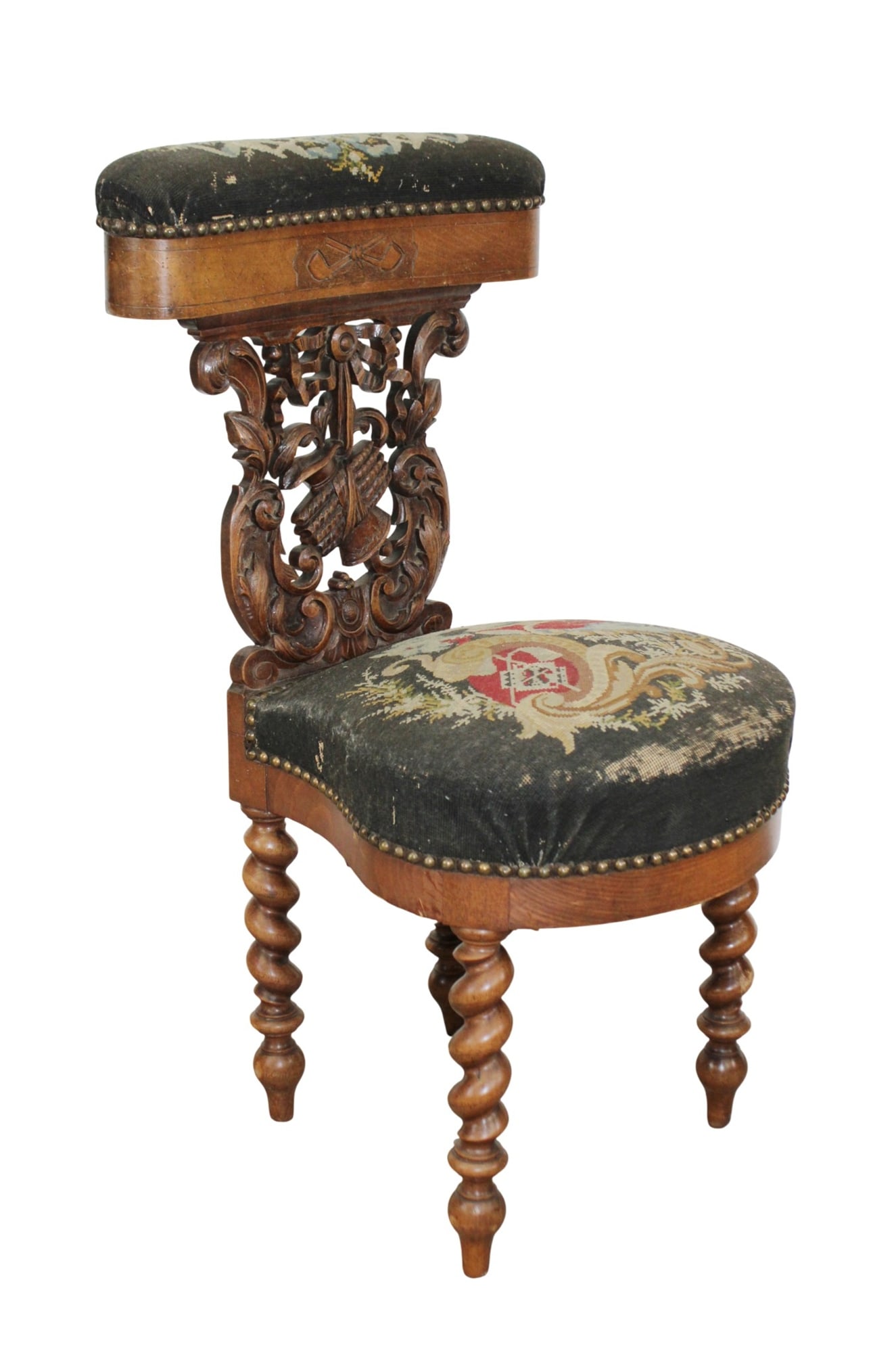 French carved walnut smokers chair: French carved walnut smokers chair. Late 19th century. 35 1/2"h x 19"w x 18 1/2"d Seat 19"h