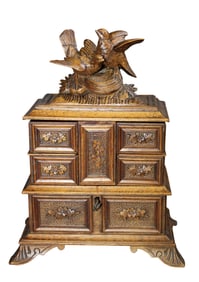 Black Forest carved walnut dresser box with birds