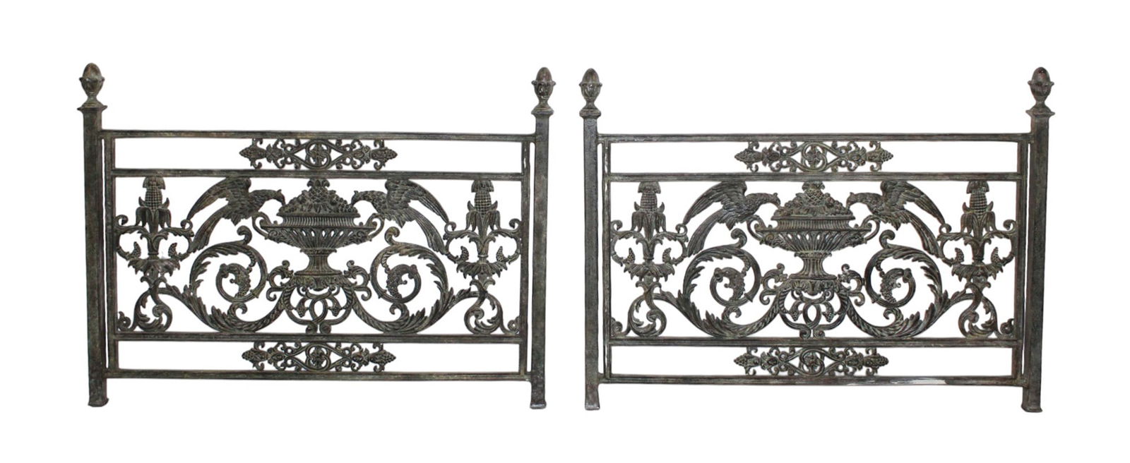 Pair of French neo-classical wrought iron balcony panels: Pair of French neo-classical wrought iron balcony panels with birds flanking central urn. 32"h x 43"w Each panel