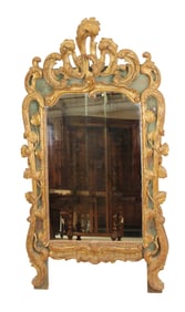 Italian polychrome mirror in giltwood on painted green field. Relief acanthus scrolls and ivy