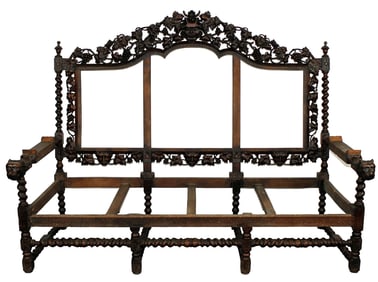 French heavily carved sofa frame with Bacchus mask, grapevines and lion head arms on barley twist