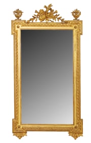 French Louis XVI gold leaf mirror with musical instrument crest