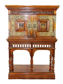 English relief carved court cupboard with brass decoration