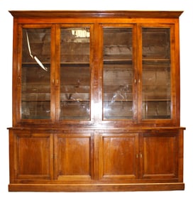 French Louis Philippe bookcase in walnut with 4 glass doors on top and 4 doors on the bottom