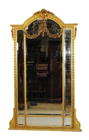 French Louis XVI style gilt mirror with floral garland