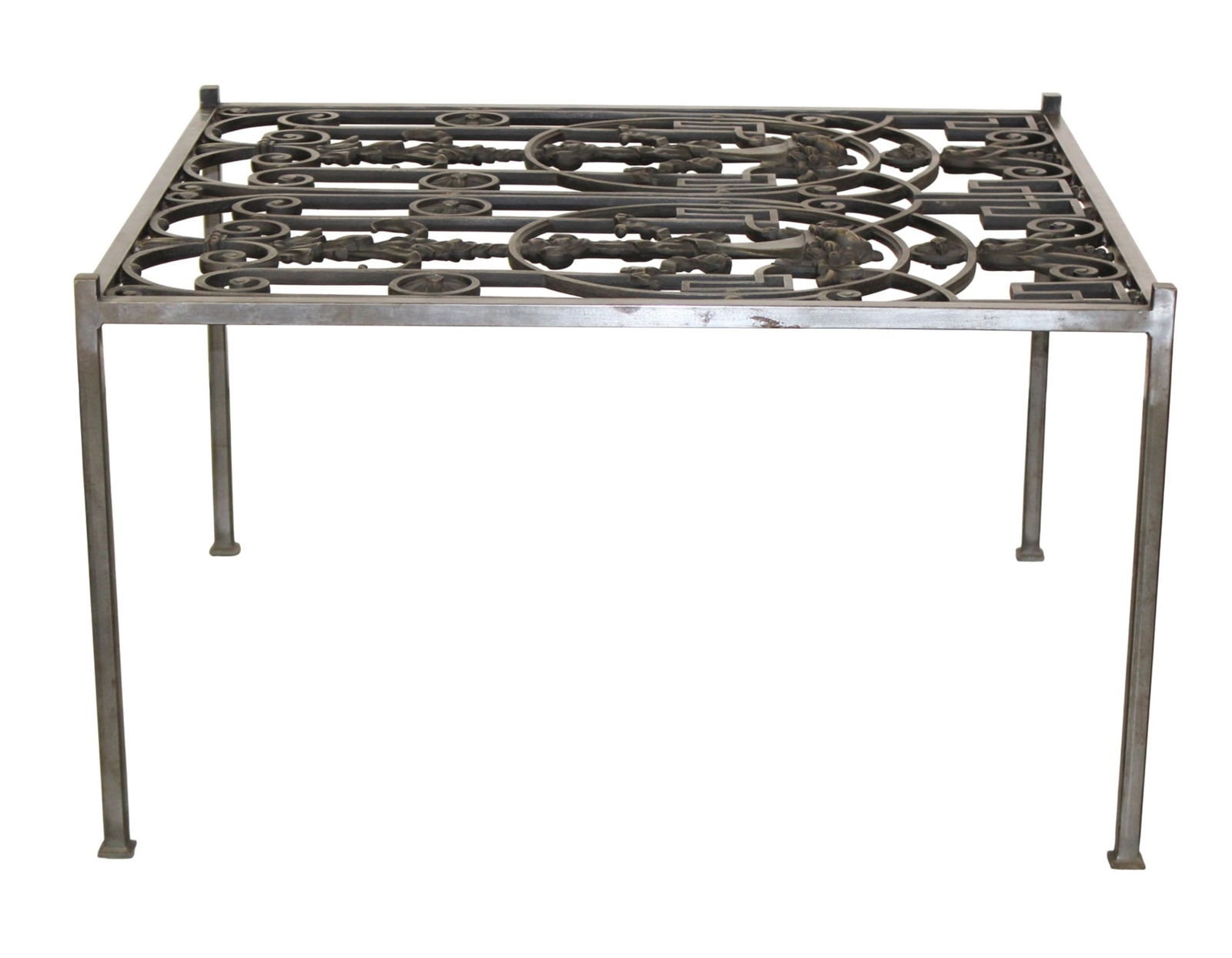 Wrought iron panel mounted as coffee table: Wrought iron panel with flowering urns mounted as coffee table. 21"h x 36 1/4" square
