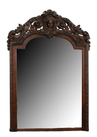French Renaissance Revival carved oak mirror with female mask